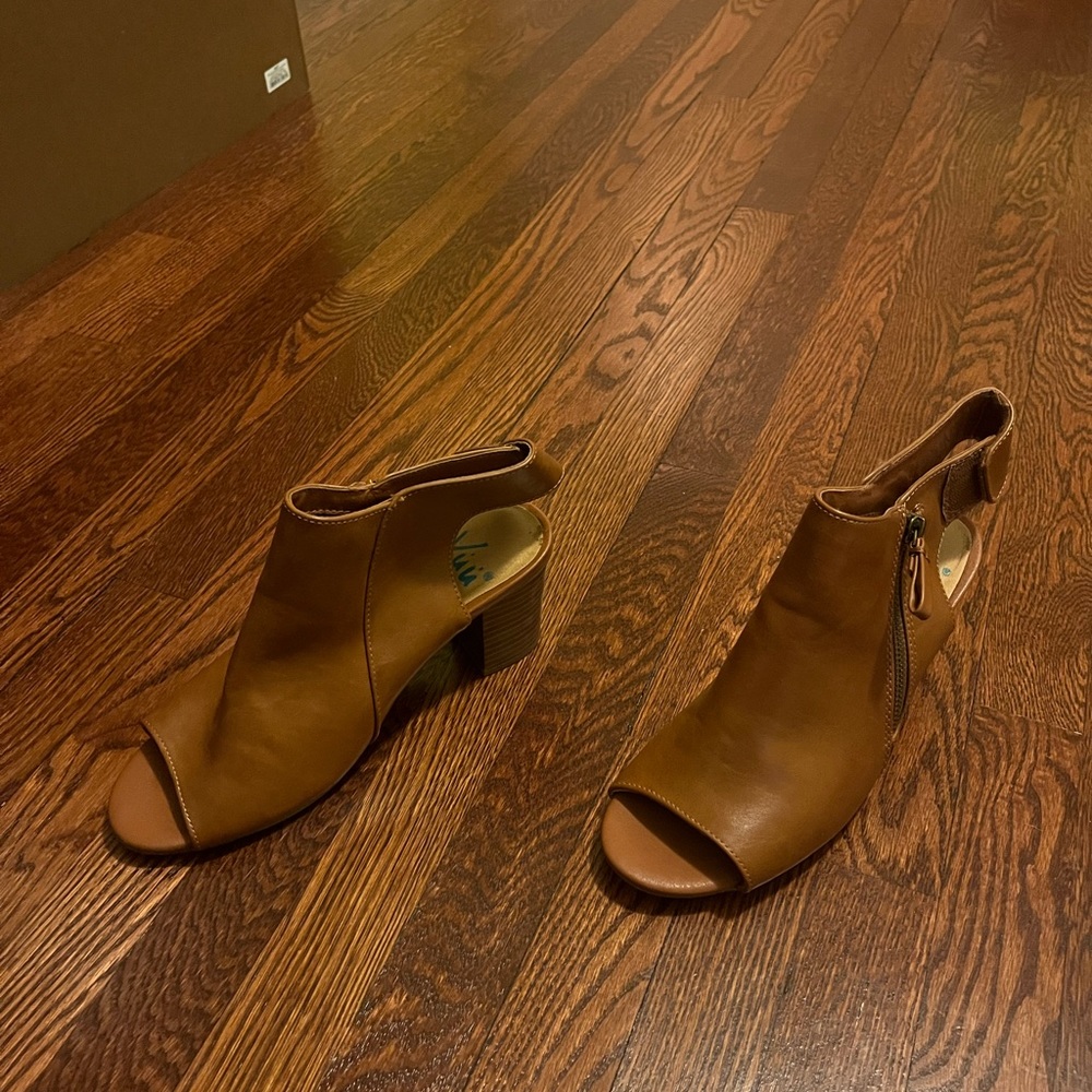 Tan heeled open toe boots